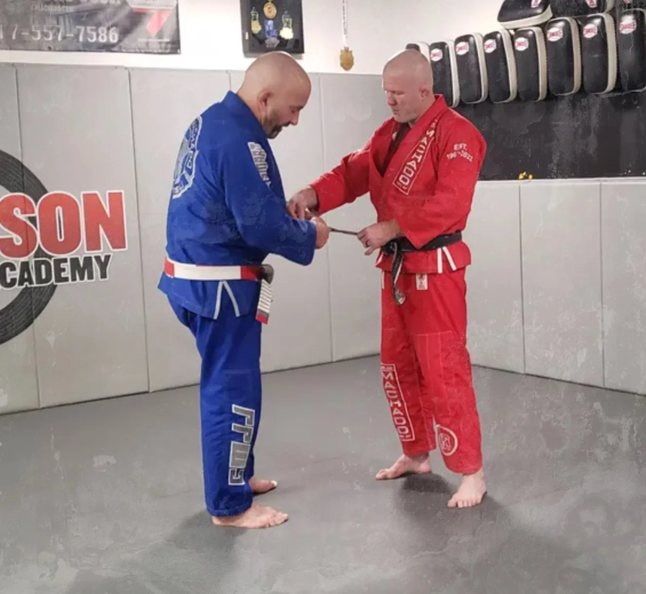 A black belt promotion in the Carlos Machado lineage at Sampson Jiu Jitsu Academy