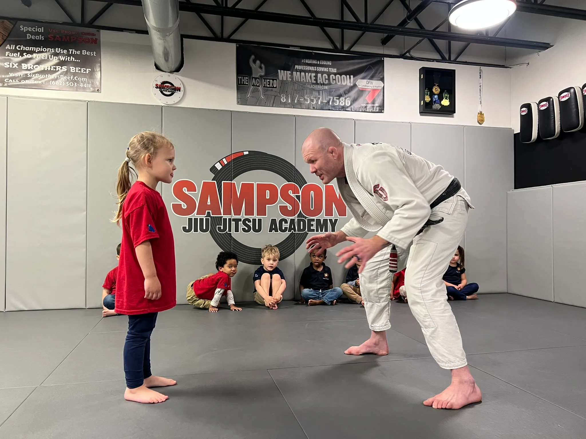 Brazilian Jiu Jitsu student in a blue gi at Sampson Jiu Jitsu Academy in Southlake, TX